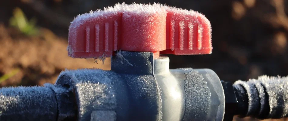 Frost-covered irrigation valve on a property in Memphis, TN.